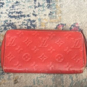 Louis Vuitton Red Leather Wallet with Monogram Pattern